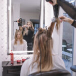 hairstylist-using-brush-dryer